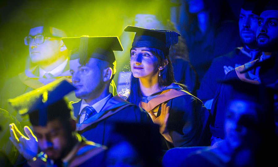 Image of DMU students at a graduation ceremony