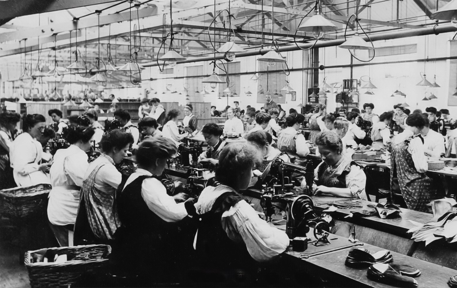Staff working at sewing machines in Portland Shoe Factory. Image courtesy of the Record Office of Leicester Leicestershire and RutlandWomen