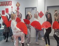 Dancing with friends, exhibiting martial arts spirit