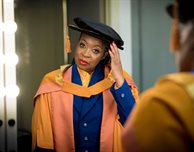 Fashion consultant to the stars collects honorary doctorate