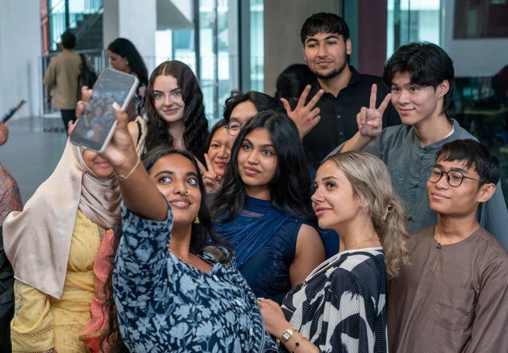 APU and DMU students taking a group picture