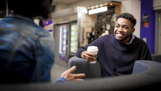 Two students mid-conversation