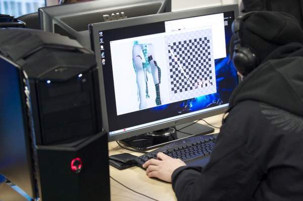 Student working on a texture map at a PC
