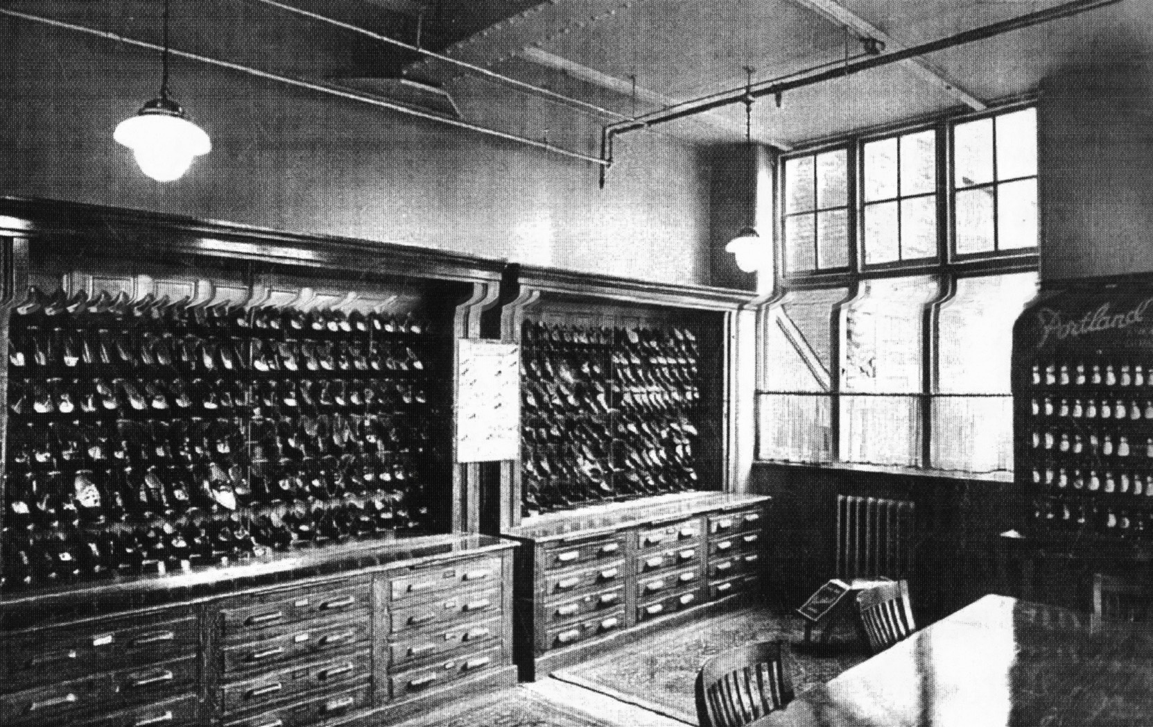 Portland Shoe factory sample room. Staff working at sewing machines in Portland Shoe Factory. Image courtesy of the Record Office of Leicester Leicestershire and Rutland 