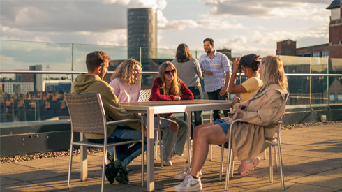 DMU students on rooftop terrace