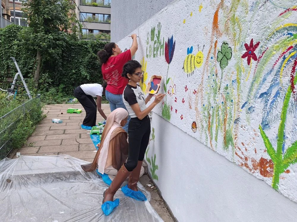 Students volunteering at a centre for asylum seekers and refugees in Berlin