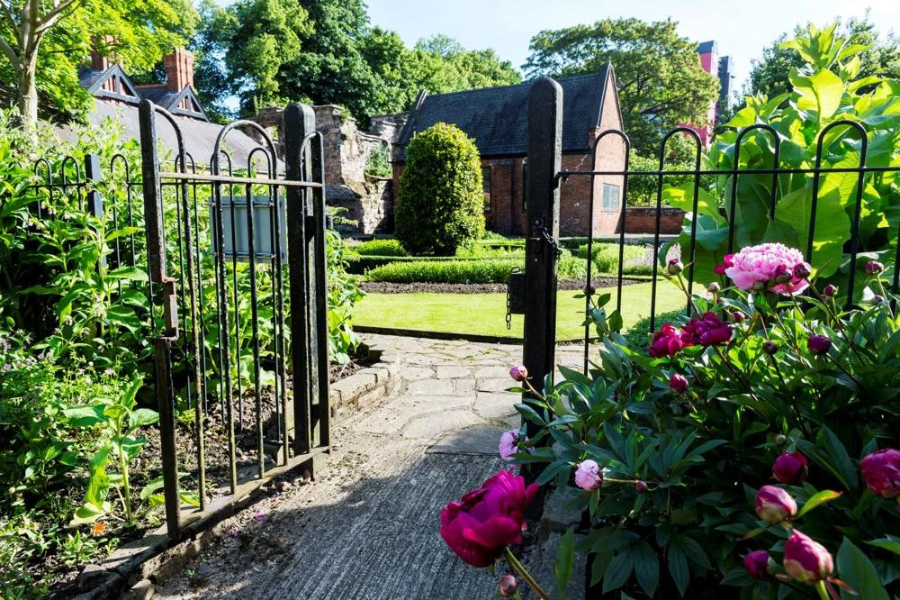The historic herb garden in the grounds of the 14th century Trinity House
