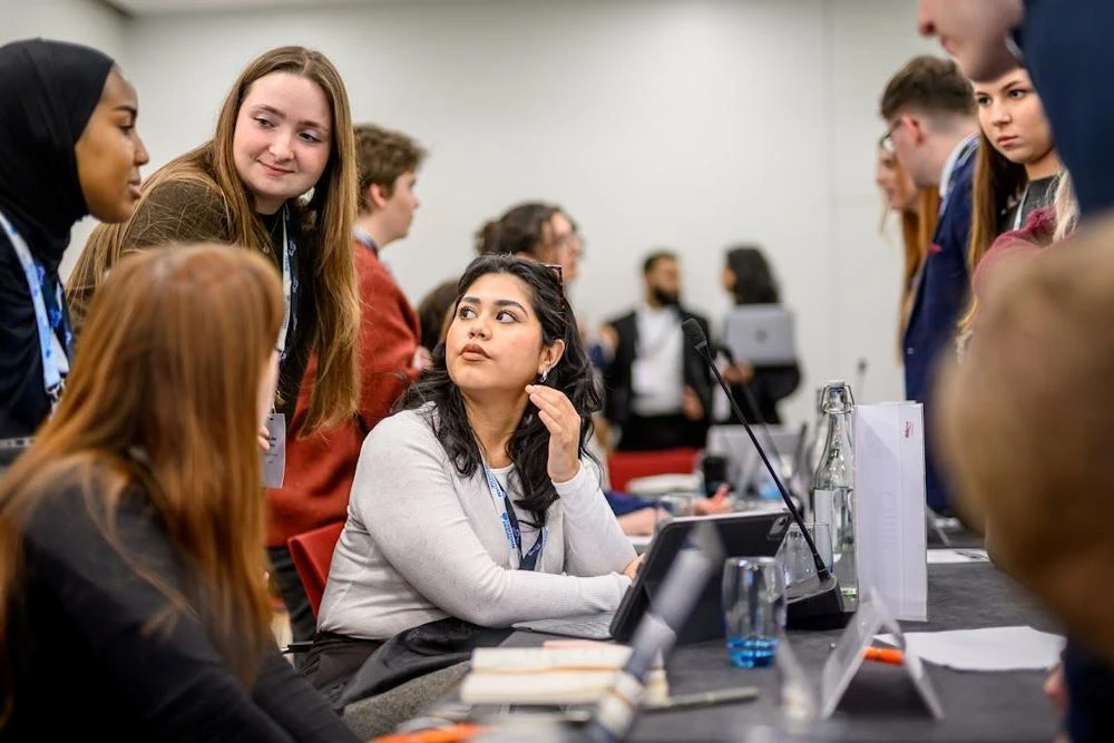 Cristina Quinonez and Daisy-Mae Addley during the Chatham House climate simulation event