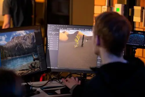 A student using software on screen to control the video wall