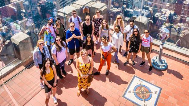 A group of students on a New York rooftop