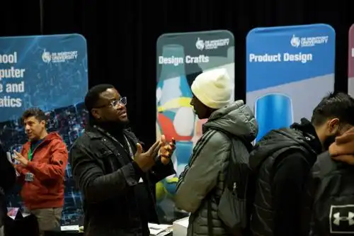 Academics and students talking to visitors