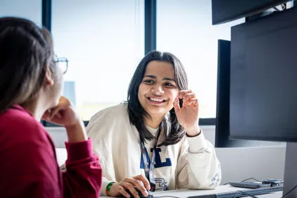Students engaging in practical learning at DMU London
